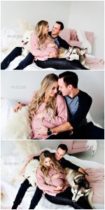 Studio Maternity Photos with Pups Dogs Husband White Studio On Bed Kansas City Maternity
