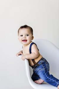 Baby Boy Pictures Jeans Suspenders Photographer Kansas City Childrens Photography Sitting Up Photos