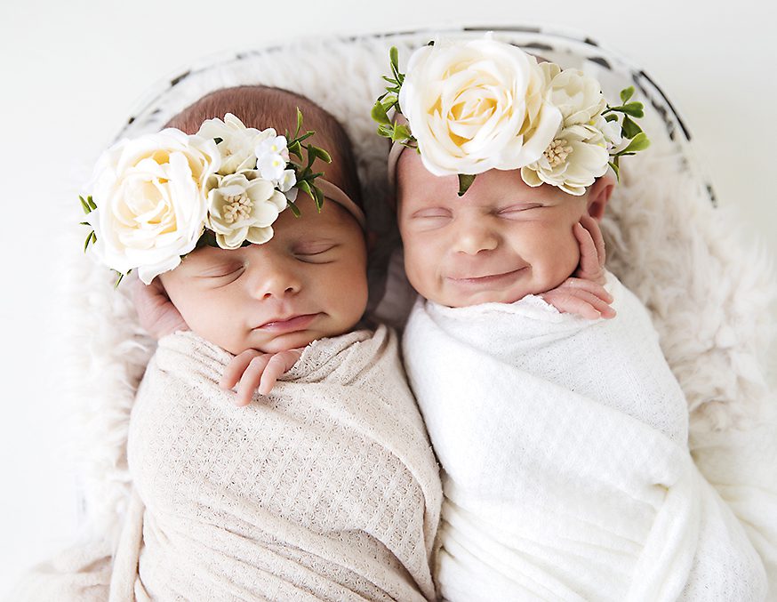 Newborn Twin Smiles